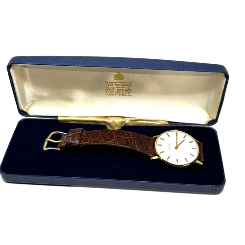 392 - Vintage Boxed presentation Garrards gents wristwatch the watch is in working order in original garra... 