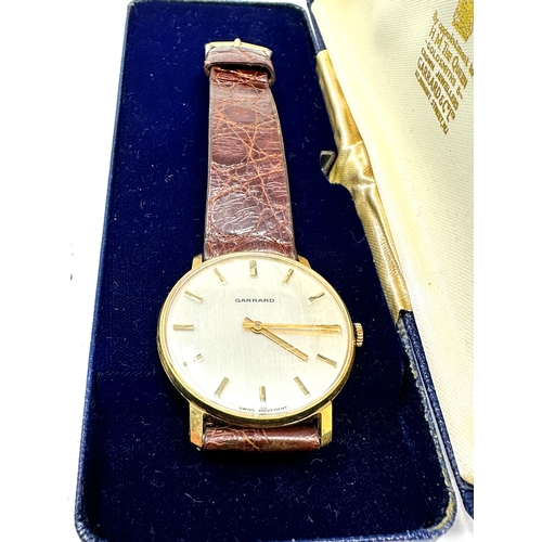 392 - Vintage Boxed presentation Garrards gents wristwatch the watch is in working order in original garra... 