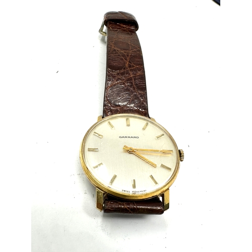 392 - Vintage Boxed presentation Garrards gents wristwatch the watch is in working order in original garra... 