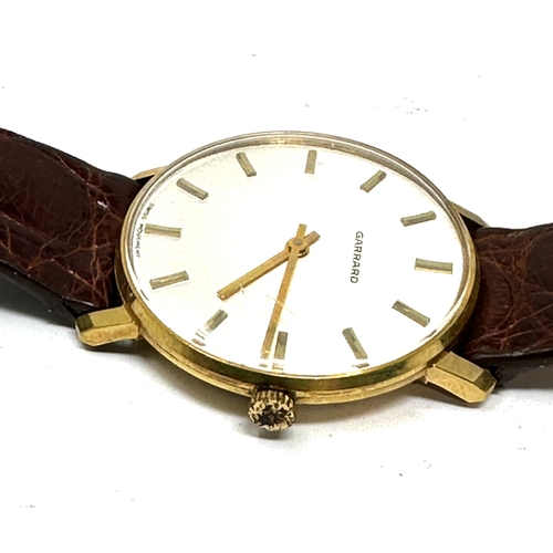 392 - Vintage Boxed presentation Garrards gents wristwatch the watch is in working order in original garra... 