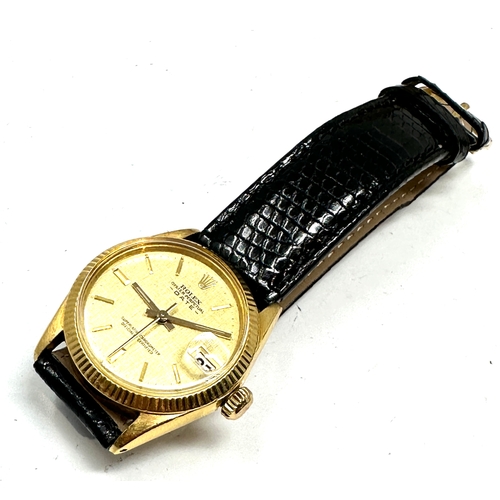 398 - Boxed 18ct gold ladies rolex oyster perpetual date chronometer with black leather strap with 18ct go... 