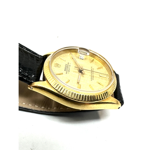 398 - Boxed 18ct gold ladies rolex oyster perpetual date chronometer with black leather strap with 18ct go... 