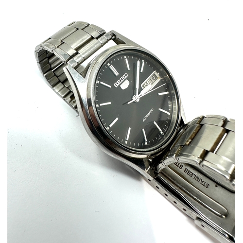 408 - Vintage Seiko 5 Automatic Day & Date 7009 -3100 the watch is ticking black dial