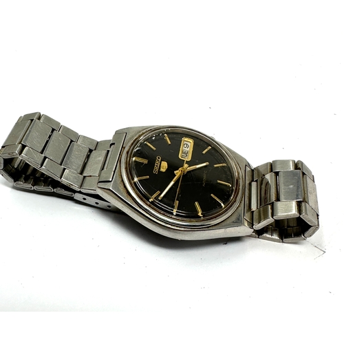 409 - Vintage Seiko 5 Automatic Day & Date 7009 -3140 the watch is ticking black dial