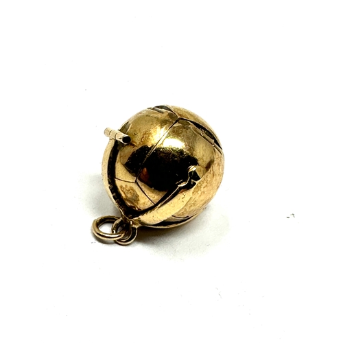 101 - Gold & silver masonic ball pendant hallmarked 375 & silver hallmarks on interior weight 10.g