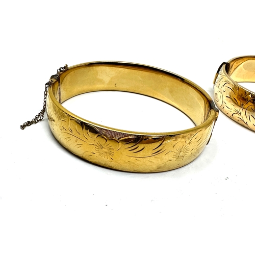 102 - 2 Vintage rolled gold  1/5 9ct gold bangles weight 62g