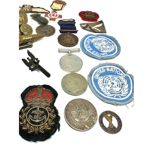 473 - selection of military items inc bullet lighter cap badges buttons patches etc