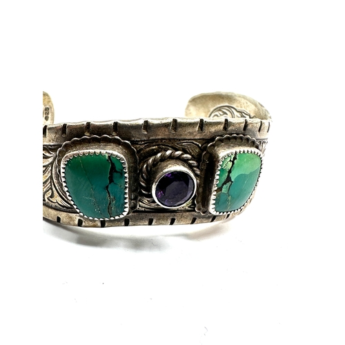 266 - Vintage silver turquoise and amethyst signed navajo bangle weight 65g