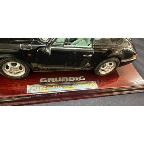 2 - Grundig Porsche 911 Carrera 4 Cabriolet model toy