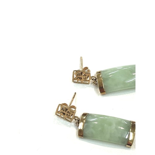 254 - 9ct gold jade with chinese symbols drop earrings with scrolls backs