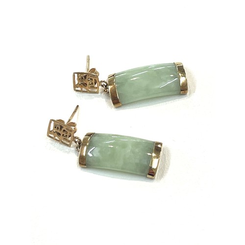 254 - 9ct gold jade with chinese symbols drop earrings with scrolls backs