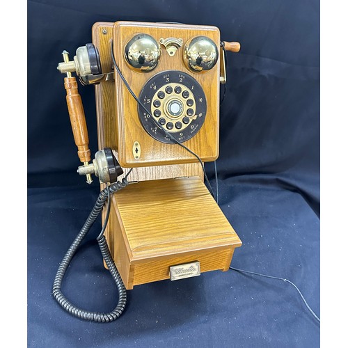 70 - Vintage classic wall hanging phone in working order in an oak case