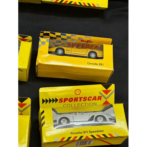 88 - Selection of boxed Maisto cars includes jaguar etc