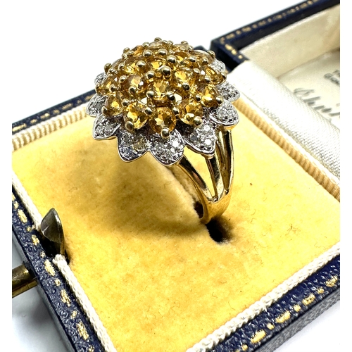 99 - 9ct gold diamond & yellow sapphire ring weight 3.4g