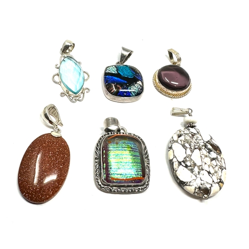 293 - 6 silver & stone set pendants weight 80g