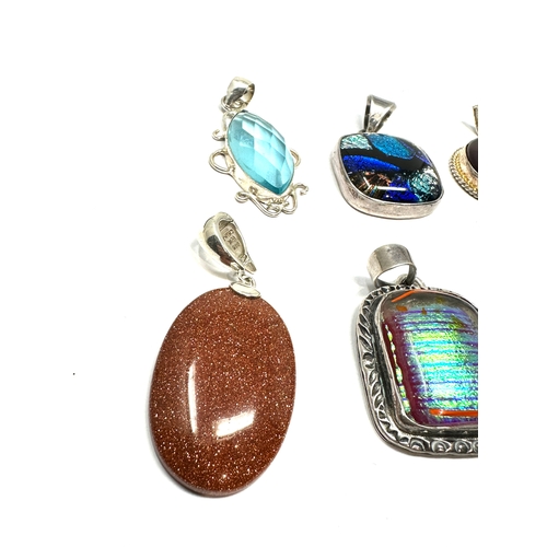 293 - 6 silver & stone set pendants weight 80g