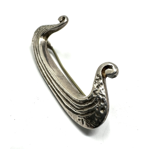 250 - Silver malcolm gray celtic ship brooch measures approx 4.6cm wide