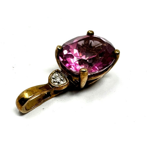 120 - 9ct gold pink tourmaline & diamond pendant weight 2.9 g