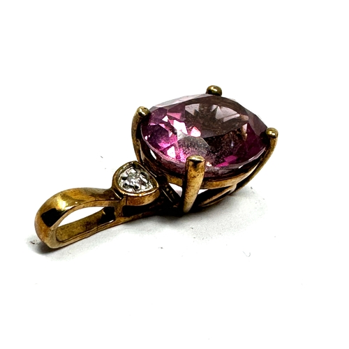 120 - 9ct gold pink tourmaline & diamond pendant weight 2.9 g