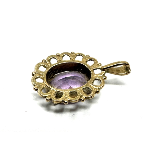 121 - 9ct gold amethyst  pendant weight 1.7g