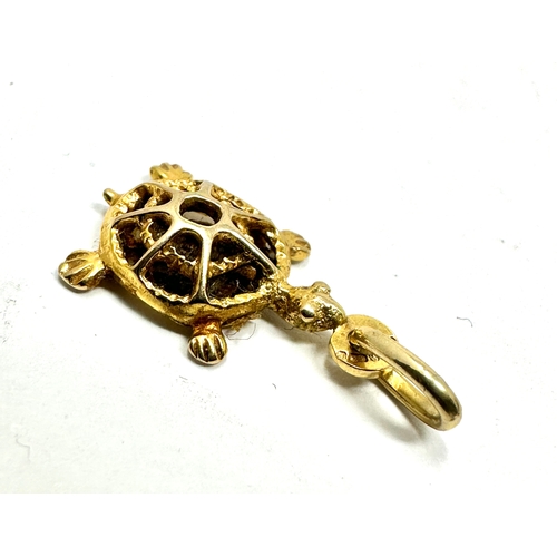 126 - 9ct gold tortoise charm weight 1.3g