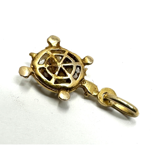 126 - 9ct gold tortoise charm weight 1.3g