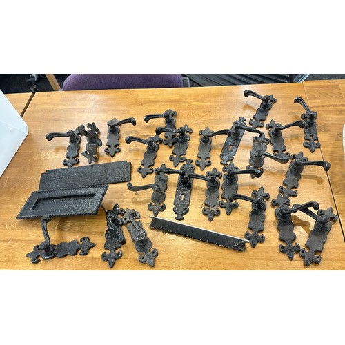 279 - Selection of vintage cast door handles, hinges, letter box etc