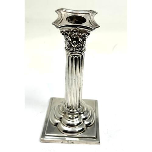 19 - Antique silver corinthian column candlestick measures approx height 17cm London silver hallmarks fil... 