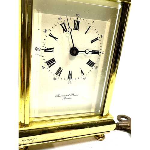 473 - Brass carriage clock & key by bornand freres bicester clock ticks but stops