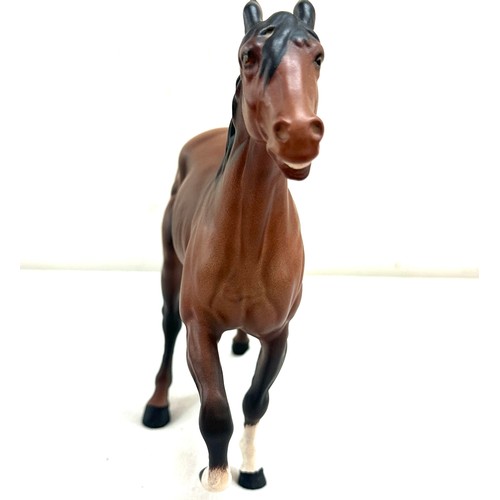 58 - Beswick horse figure measures approx 8 inches tall by 11 inches wide