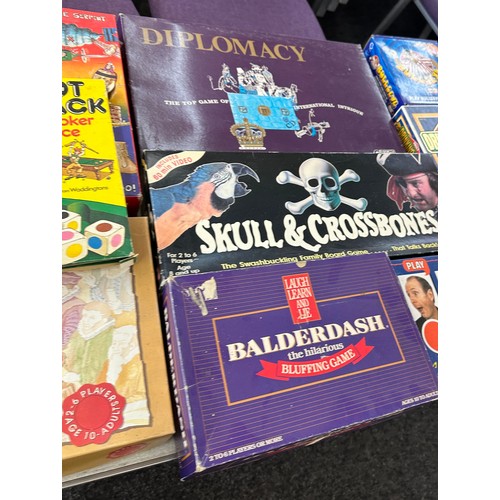 331 - Selection of vintage board games to include monopoly, roly poly, bulls eye etc