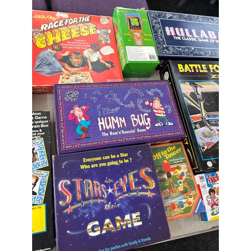 325 - Selection of vintage board games to include trivia pursuit, block busters, hang man etc