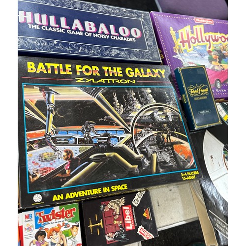 325 - Selection of vintage board games to include trivia pursuit, block busters, hang man etc