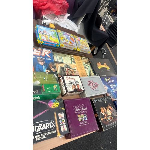 329 - Large selection of vintage board games and puzzles to include battle of the universe, who wants to b... 