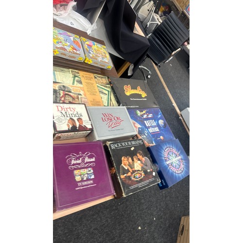 329 - Large selection of vintage board games and puzzles to include battle of the universe, who wants to b... 