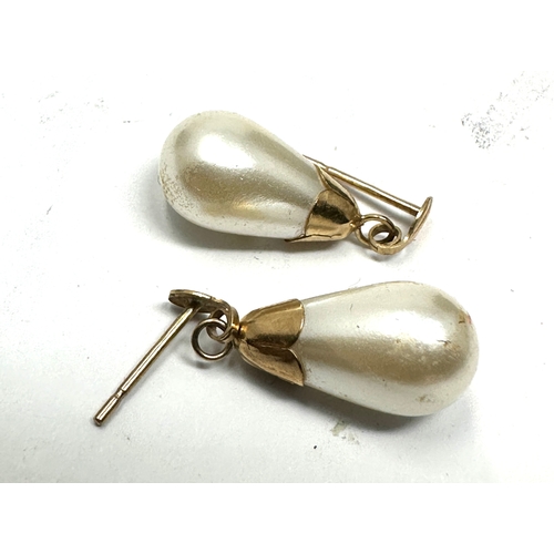 135 - 9ct gold cultured pearl drop earrings weight 1.4g