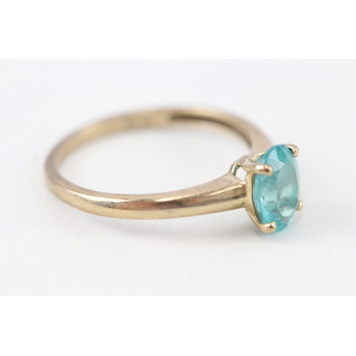 227 - 9ct gold blue gemstone ring (1.8g)