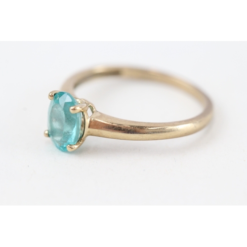 227 - 9ct gold blue gemstone ring (1.8g)