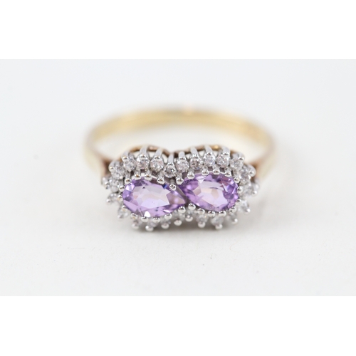 234 - 9ct gold purple & white gemstone ring (2.5g)