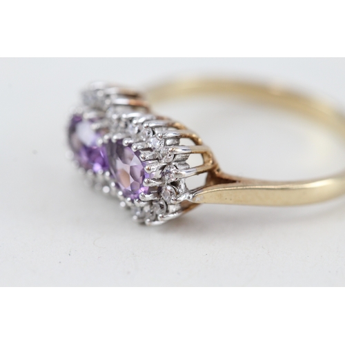 234 - 9ct gold purple & white gemstone ring (2.5g)