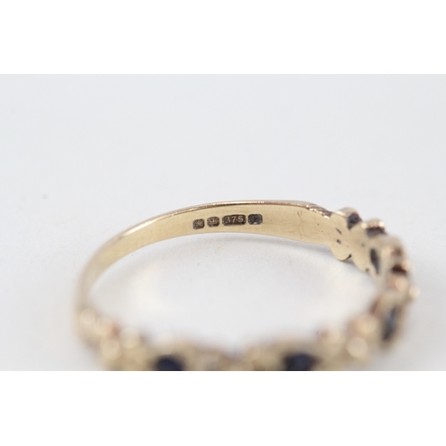 235 - 9ct gold blue gemstone half eternity ring (1.4g)