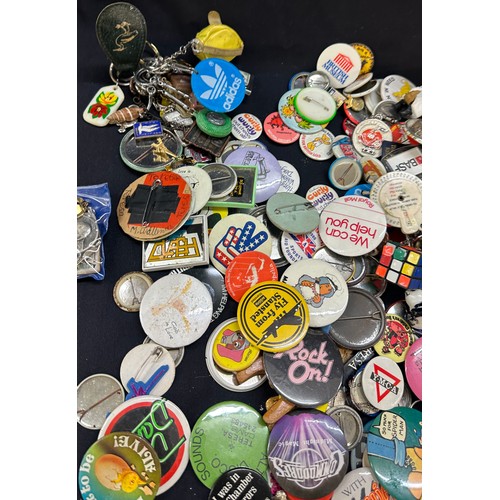 88 - Large selection of vintage and later badges and key rings