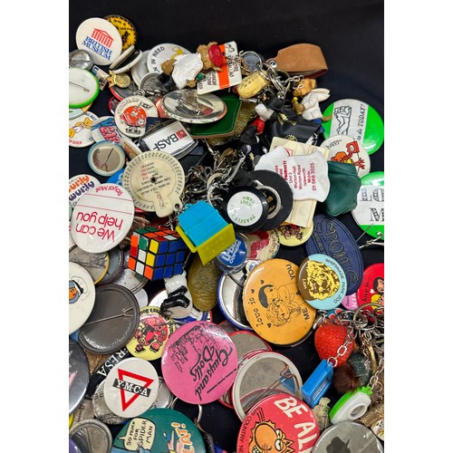 88 - Large selection of vintage and later badges and key rings