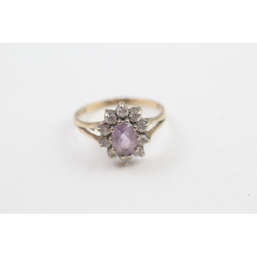 243 - 9ct gold purple & white gemstone cluster ring (1.9g)