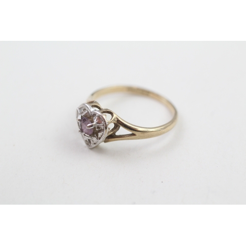 244 - 9ct gold purple & white gemstone dress ring (1.5g)