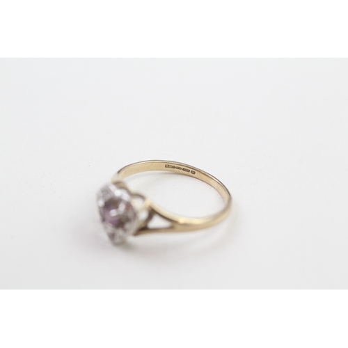 244 - 9ct gold purple & white gemstone dress ring (1.5g)