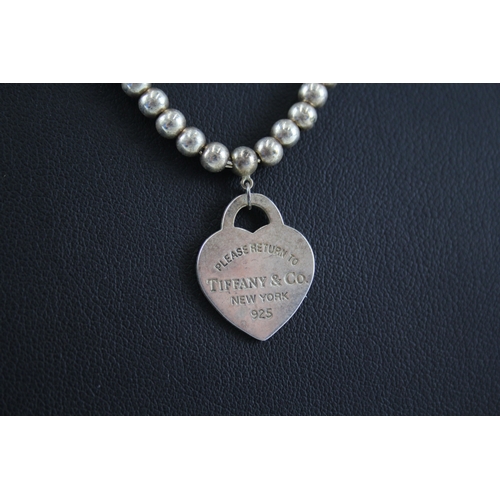 313 - Silver necklace with heart tag by designer Tiffany & Co (12g)