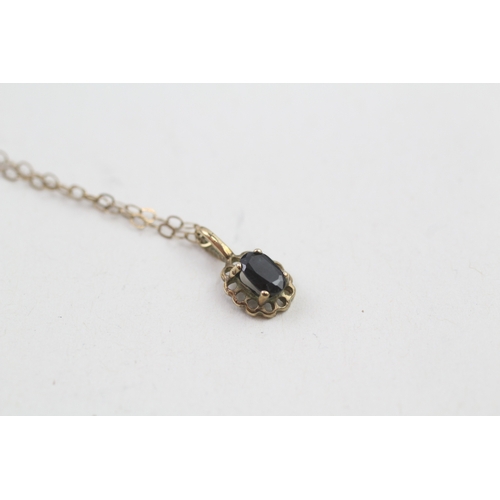 245 - 9ct gold sapphire pendant necklace (0.8g)