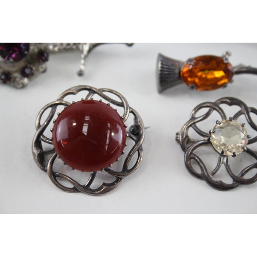 317 - Five silver Scottish/Celtic brooches including Carnelian (37g)