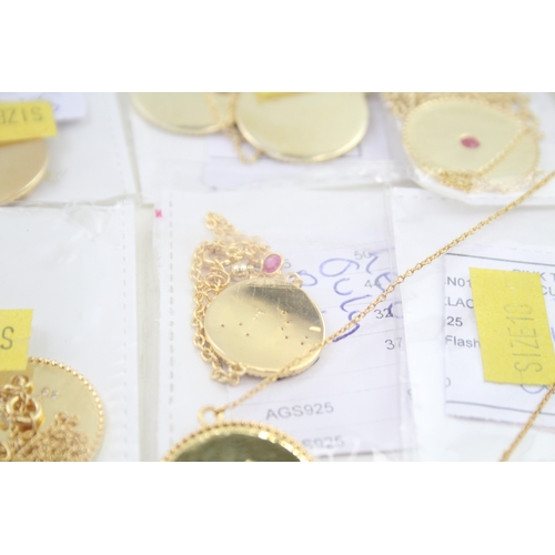 323 - A collection of gold tone silver zodiac necklaces (100g)